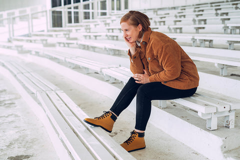 a women in a pair of Ahinsa shoes winter ankle boots