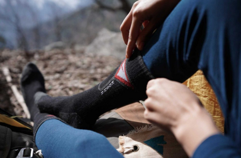 A close-up of Kosha Merino wool socks, showcasing their soft, fine-knit texture. The socks are designed for warmth, comfort, and breathability.